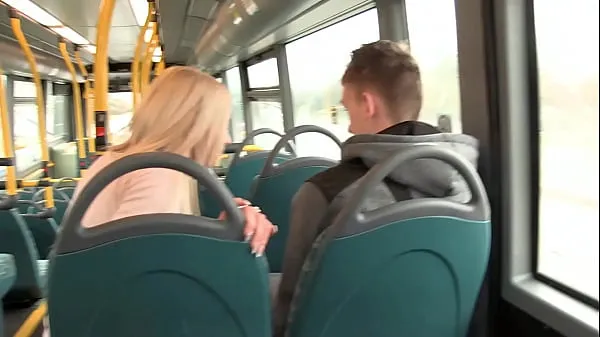 Sexy exhibitionist strips and pisses on the bus and again outdoors and goes to the intercom naked