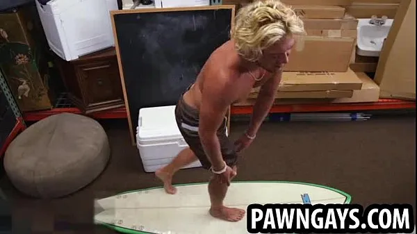 Fresh Surfer stud posing for some photos at the pawn shop energy Videos
